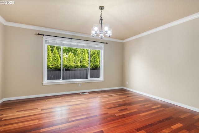 14956 SE Pebble Beach Dr, Happy Valley, OR 97086 - unfurnished room with a chandelier, ornamental molding, and wood finished floors