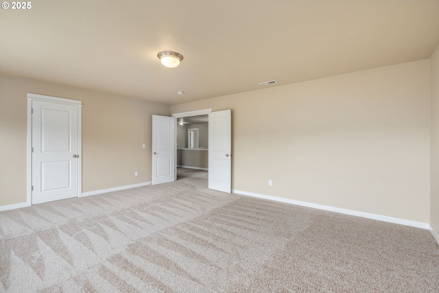 14956 SE Pebble Beach Dr, Happy Valley, OR 97086 - unfurnished bedroom featuring baseboards and carpet floors