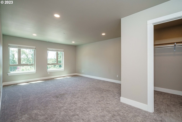 304 N Bridgeton Rd, Portland, OR 97217 - unfurnished bedroom featuring carpet flooring, recessed lighting, a spacious closet, and a closet