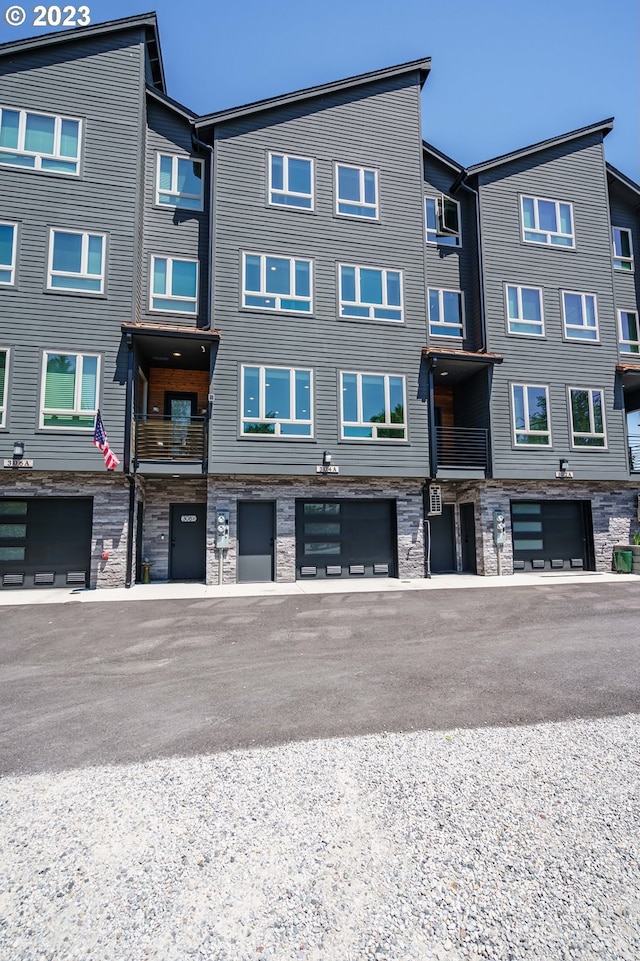304 N Bridgeton Rd, Portland, OR 97217 - view of building exterior featuring an attached garage