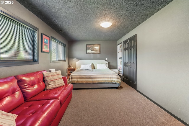 703 NW 94th St, Vancouver, WA 98665 - bedroom with carpet and a textured ceiling