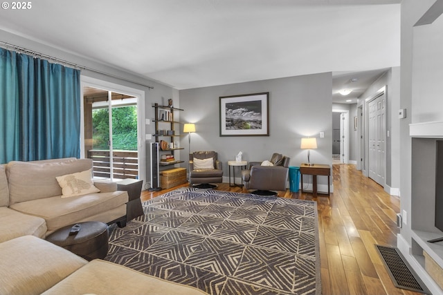 703 NW 94th St, Vancouver, WA 98665 - living area featuring hardwood / wood-style flooring and baseboards