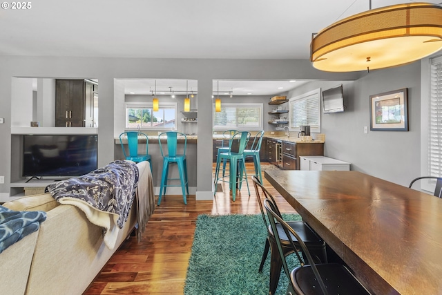 703 NW 94th St, Vancouver, WA 98665 - dining area with dark wood-type flooring and rail lighting