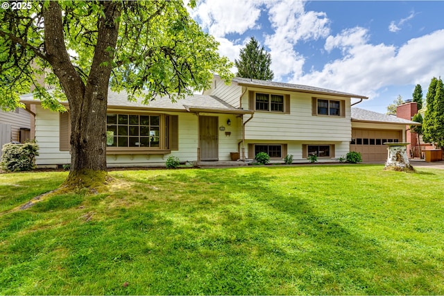 488 Pinto Way, Eugene, OR 97401 - tri-level home featuring an attached garage, a front yard, and driveway