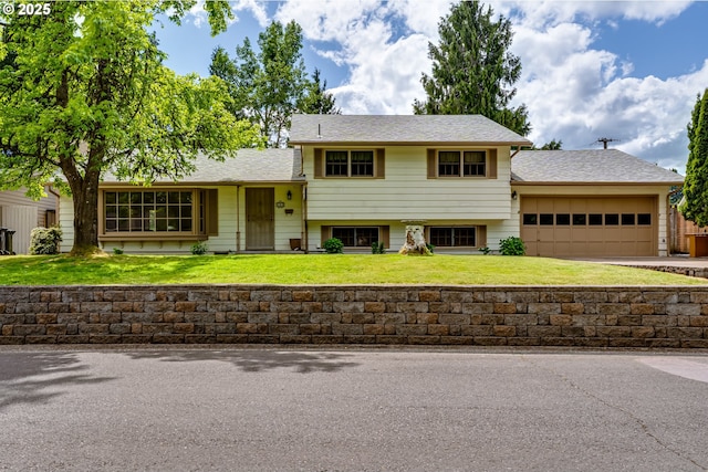 488 Pinto Way, Eugene, OR 97401 - tri-level home featuring concrete driveway, a front lawn, and an attached garage