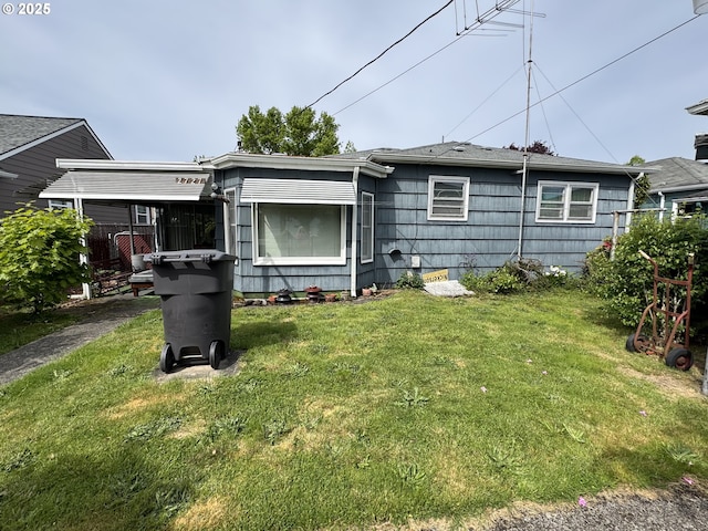 2727 Maple St, Longview, WA 98632 - rear view of property with a lawn