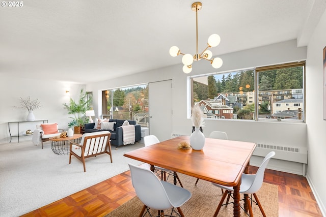 2323 SW Park Pl Unit 603, Portland, OR 97205 - dining space with a chandelier