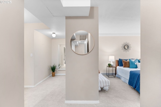 carpeted bedroom with baseboards