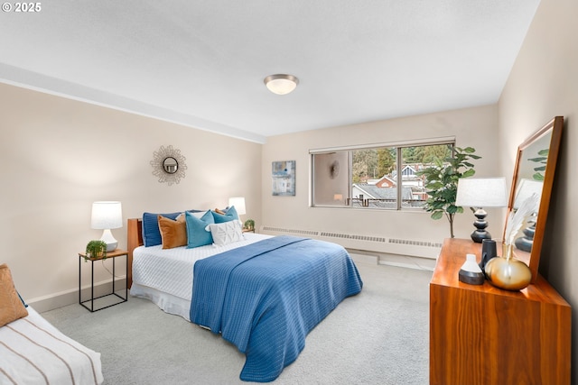 2323 SW Park Pl Unit 603, Portland, OR 97205 - bedroom with carpet floors, radiator heating unit, and baseboards