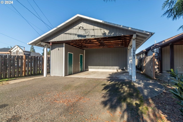 exterior space with a carport