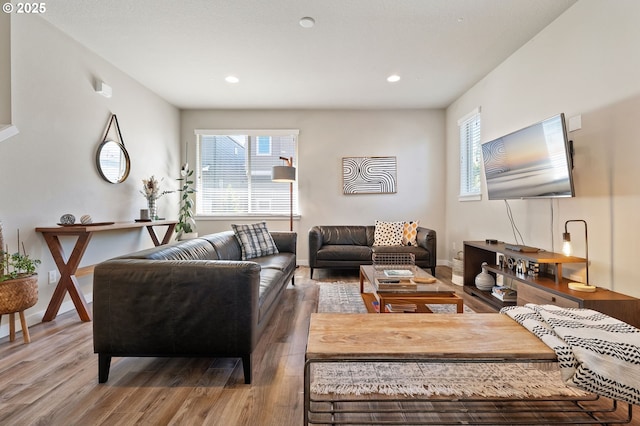 14139 SW Burlwood Ln, Beaverton, OR 97005 - living area with wood finished floors and recessed lighting