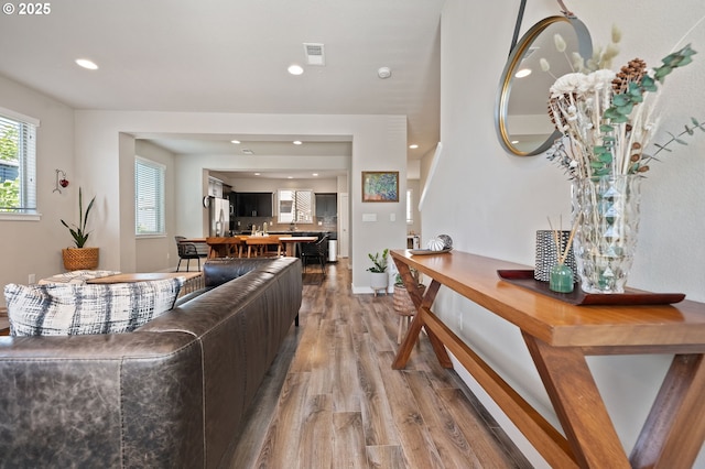 14139 SW Burlwood Ln, Beaverton, OR 97005 - living area with wood finished floors and recessed lighting