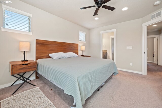 14139 SW Burlwood Ln, Beaverton, OR 97005 - carpeted bedroom featuring recessed lighting, ensuite bath, and a ceiling fan