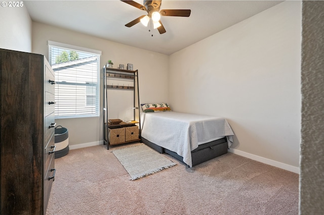 14139 SW Burlwood Ln, Beaverton, OR 97005 - carpeted bedroom with baseboards and a ceiling fan