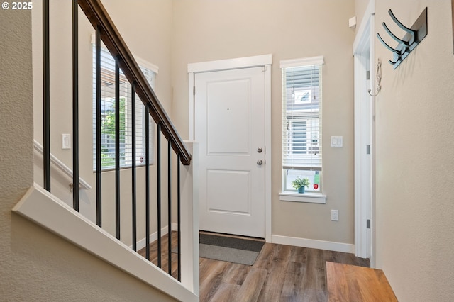14139 SW Burlwood Ln, Beaverton, OR 97005 - entrance foyer featuring wood finished floors and stairway