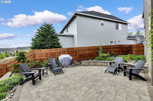 view of patio / terrace with a grill and a fenced backyard