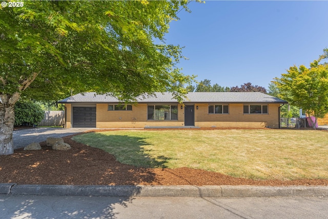 2859 NE 2nd Ave, Camas, WA 98607 - ranch-style house with gravel driveway, an attached garage, and brick siding