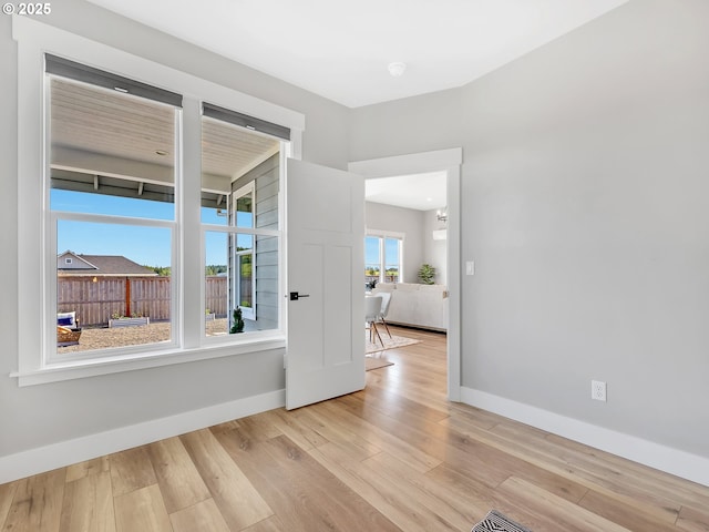 1155 SE Bugle Ave, Warrenton, OR 97146 - unfurnished room featuring baseboards and wood finished floors