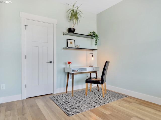 1155 SE Bugle Ave, Warrenton, OR 97146 - office area with wood finished floors and baseboards