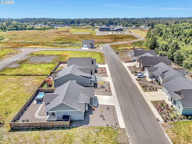 1155 SE Bugle Ave, Warrenton, OR 97146 - aerial perspective of suburban area featuring a heavily wooded area