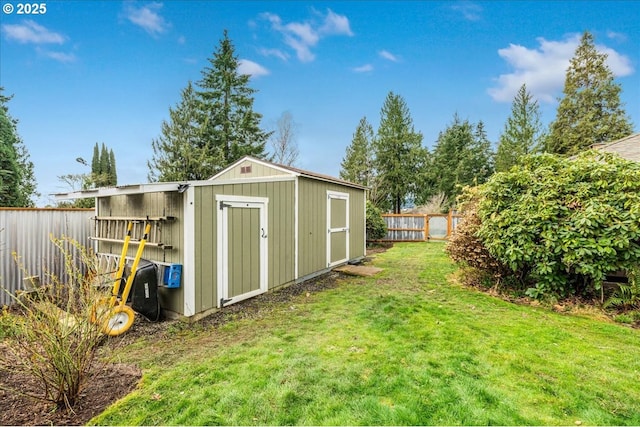 view of shed featuring a fenced backyard