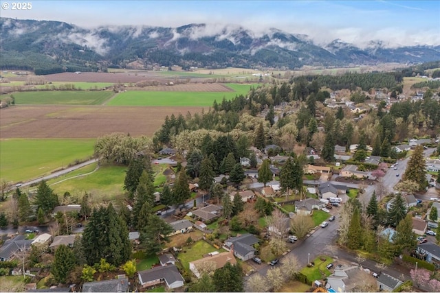 bird's eye view with a mountain view and a rural view