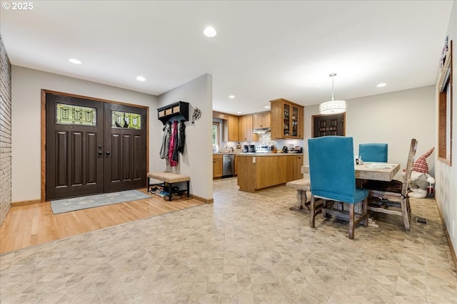 dining area with recessed lighting and baseboards