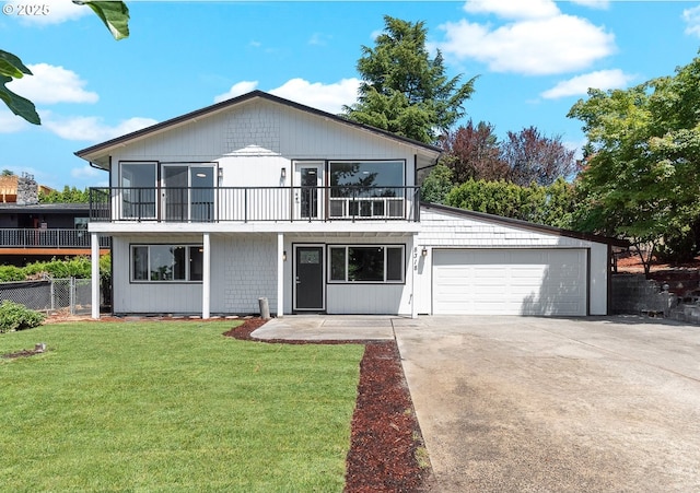 8318 SE Middle Way, Vancouver, WA 98664 - view of front facade featuring a balcony, driveway, and an attached garage