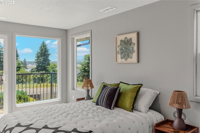 8318 SE Middle Way, Vancouver, WA 98664 - bedroom featuring multiple windows
