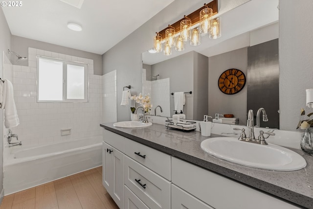 8318 SE Middle Way, Vancouver, WA 98664 - full bathroom with double vanity, wood finished floors, and shower / bath combination