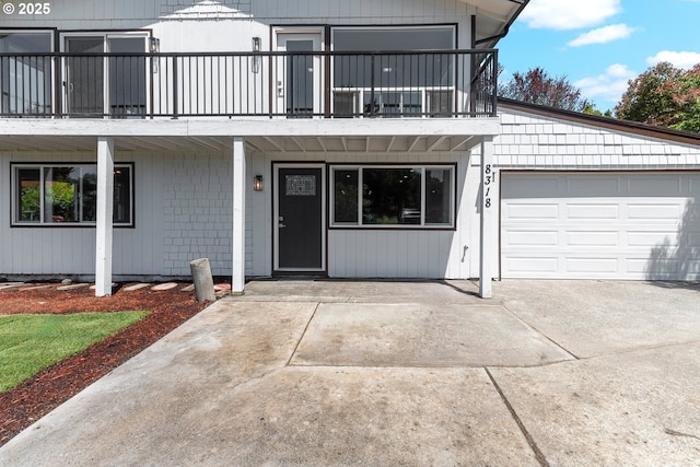 8318 SE Middle Way, Vancouver, WA 98664 - view of front of home with a balcony, a garage, and driveway