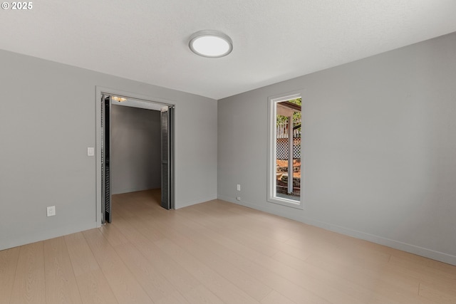 8318 SE Middle Way, Vancouver, WA 98664 - unfurnished room with light wood finished floors and baseboards