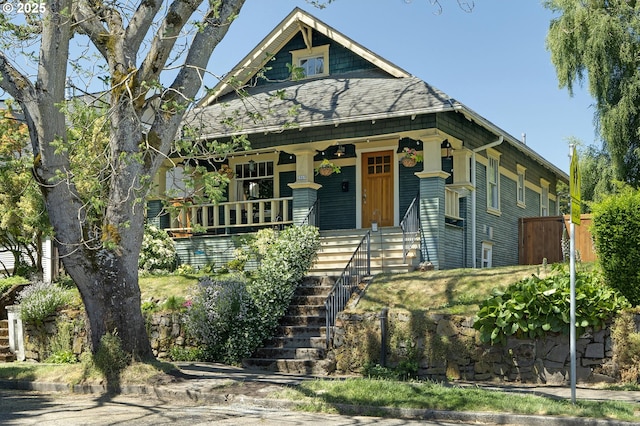 2869 SE Sherman St, Portland, OR 97214 - view of front of property featuring covered porch and stairs