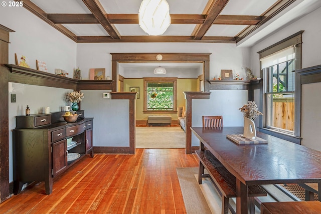 2869 SE Sherman St, Portland, OR 97214 - dining space with light wood-type flooring, coffered ceiling, and beam ceiling