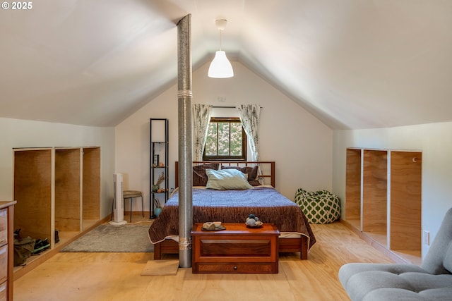 2869 SE Sherman St, Portland, OR 97214 - bedroom featuring wood finished floors and lofted ceiling