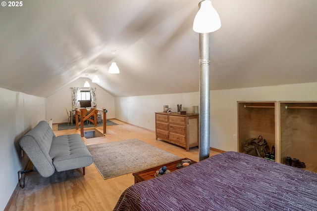 2869 SE Sherman St, Portland, OR 97214 - bedroom featuring vaulted ceiling and wood finished floors