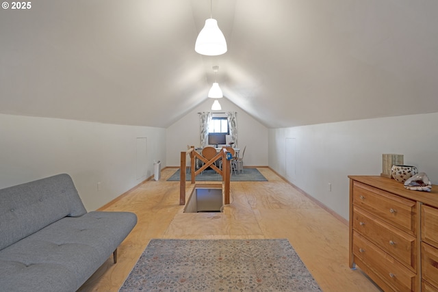 2869 SE Sherman St, Portland, OR 97214 - recreation room with baseboards and vaulted ceiling