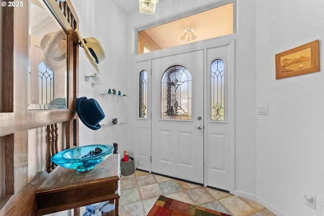 entrance foyer featuring baseboards