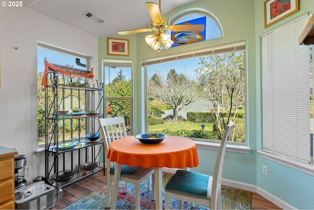 sunroom / solarium featuring a wealth of natural light and visible vents