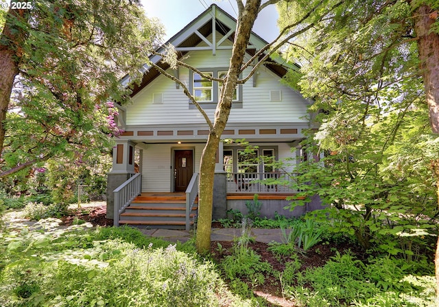 craftsman-style house featuring covered porch