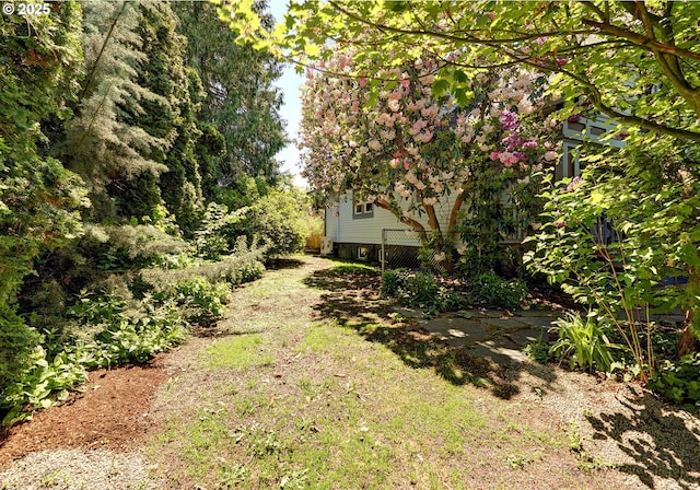 view of yard featuring fence