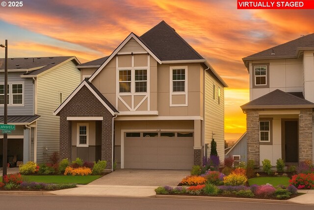 17920 SW Alvord Ln, Beaverton, OR 97007 - view of front of property with an attached garage, concrete driveway, stucco siding, stone siding, and a shingled roof