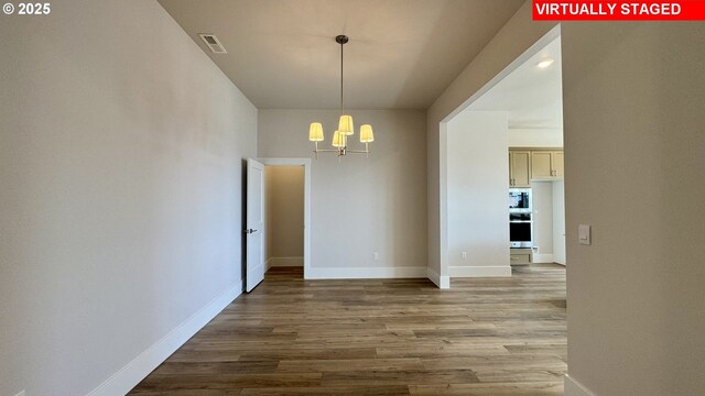 17920 SW Alvord Ln, Beaverton, OR 97007 - kitchen with appliances with stainless steel finishes, dark wood finished floors, plenty of natural light, decorative backsplash, and recessed lighting