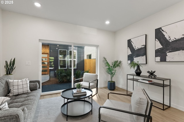 sitting room with light hardwood / wood-style floors