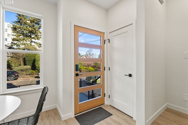 entrance foyer featuring light wood-type flooring