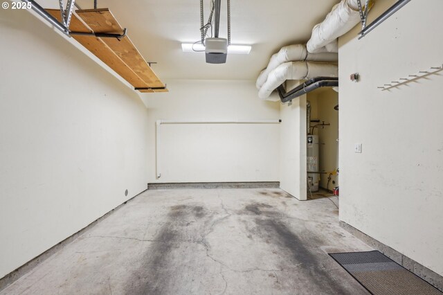 727 SE 33rd Pl Unit 21, Portland, OR 97214 - garage featuring a garage door opener and electric panel