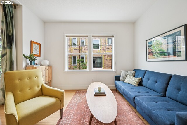 727 SE 33rd Pl Unit 21, Portland, OR 97214 - living area with wood finished floors and baseboards