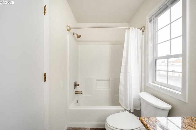 full bathroom featuring toilet, shower / bath combo, and vanity