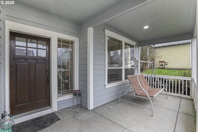 entrance to property with covered porch