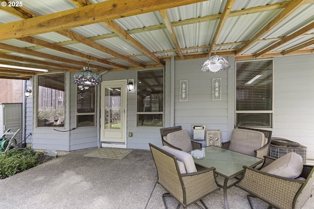 view of patio / terrace featuring outdoor dining area and central air condition unit